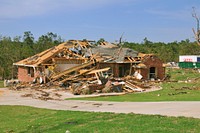 Oklahoma County, OK, May 24, 2010 -- Little remains of a home destroyed by one of the 22 confirmed tornadoes that swept across eastern Oklahoma on May 10. The powerful storms produced the fourth largest single-day outbreak in the state's history. FEMA Photo by Win Henderson