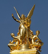 Harmony by Charles Gumery (1827–1871). Gilt galvanoplastic bronze (electrotype), H. 7.5 m (24 ft. 7 ¼ in.). Crowning of the façade of the Palais Garnier, Paris.