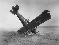 A German CL.IIIa (serial no. 3892/18) airplane brought down in the Forest of Argonne by American machine gunners between Montfaucon and Cierges, France, showing black crosses with white fimbriation, 4 October 1918