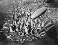 The U.S. Navy airship USS Akron (ZRS-4) flying over the southern end of Manhattan, New York, New York, United States, circa 1931-1933.