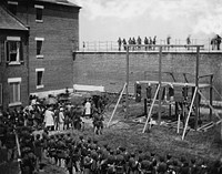 Execution of the four people condemned as conspirators (Mary E. Surratt, Lewis T. Powell, David E. Herold, and George A. Atzerodt)