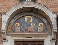 Mosaic of the Madonna with Child, pediment of the side entrance of the church Santa Maria in Aracoeli, Rome, Italy.