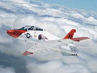 A T-45A Goshawk executes a turning rejoin during a recent formation flight over South Texas. The T-45 is a twin-seat, single-engine jet trainer and is the only aircraft in the Navy's inventory used specifically for training pilots to land aboard aircraft carriers.