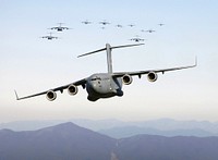 Thirteen C-17 Globemaster III aircraft fly over the Blue Ridge Mountains in Virginia during low level tactical training Dec. 20, 2005. These C-17 planes are assigned to the 437th and 315th Airlift Wings at Charleston Air Force Base, S.C.