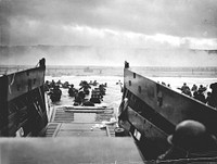 A LCVP (Landing Craft, Vehicle, Personnel) from the U.S. Coast Guard-manned USS Samuel Chase disembarks troops of the U.S. Army's First Division on the morning of June 6, 1944 (D-Day) at Omaha Beach.