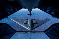 A 2nd Air Refueling Squadron KC-10 Extender from Joint Base McGuire-Dix-Lakehurst, N.J., prepares to refuel a B-2 Spirit, during a training exercise near Kansas, Nov. 10, 2016. The KC-10 Extender is an Air Mobility Command advanced tanker and cargo aircraft designed to provide increased global mobility for U.S. armed forces. Although the KC-l0's primary mission is aerial refueling, it can combine the tasks of a tanker and cargo aircraft by refueling fighters and simultaneously carry the fighter support personnel and equipment on overseas deployments. (U.S. Air Force photo by Senior Airman Keith James/Released)Unit: 3rd Combat Camera SquadronDVIDS Tags: B-2; KC-10; Air refueling; Aircraft; Air Force; AMC; USAF; Air power; boom; Air superiority; 2nd AFS; air fueling squadron; DVIDS Photos of the Day 122316