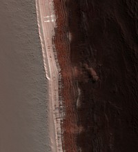 Descriptions courtesy of NASA:The image shows a Martian avalanche, or debris fall, in action.Cameras orbiting Mars have taken thousands of images that have enabled scientists to put together pieces of Mars' geologic history. However, most of them reveal landscapes that haven't changed much in millions of years. Some images taken at different times of year do show seasonal changes from one image to the next, however, it is extremely rare to catch such a dramatic event in action. (Another, unrelated, active process that has been captured by Mars cameras are dust devils.) Observing currently active processes is often a useful tool in unlocking puzzles of the past for scientists studying the Earth. Working from primarily still images, it is harder for scientists studying Mars to rely on this tool. The HiRISE image of avalanching debris is a very rare opportunity to directly do so.