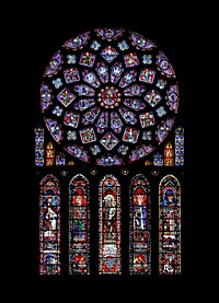 Northern rose window of Chartres cathedral. The rose depicts the Glorification of the Virgin Mary, surrounded by angels, twelve kings of Juda (David, Solomon, Abijam, Jehoshaphat, Uzziah, Ahaz, Manasseh, Hezechiah, Jehoiakim, Jehoram, Asa et Rehoboam) and the twelve lesser prophets (Hosea, Amos, Jonah, Nahum, Zephaniah, Zechariah, Malachi, Haggai, Habakkuk, Micah, Obadiah and Joel). Below, the arms of France and Castile (the window was offered by Blanche of Castile). The five lancets represent Saint Anne, mother of the Virgin, surrounded by the kings Melchizedek, David, Solomon and by Aaron, treading the sinner and idolatrous kings: Nebuchadnezzar, Saul, Jeroboam and Pharaoh.