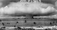 The "Baker" explosion, part of Operation Crossroads, a nuclear weapon test by the United States military at Bikini Atoll, Micronesia, on 25 July 1946. The wider, exterior cloud is actually just a condensation cloud caused by the Wilson chamber effect, and was very brief. There was no classic mushroom cloud rising to the stratosphere, but inside the condensation cloud the top of the water geyser formed a mushroom-like head called the cauliflower, which fell back into the lagoon (compare with this image, a photo taken slightly later, after the condensation cloud had cleared). The water released by the explosion was highly radioactive and contaminated many of the ships that were set up near it. Some were otherwise undamaged and sent to Hunter's Point in San Francisco, California, United States, for decontamination. Those which could not be decontaminated were sunk a number of miles off the coast of San Francisco.