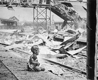 Bloody Saturday - This terrified baby was one of the only human beings left alive in Shanghai's South Station after the brutal Japanese bombing in China.