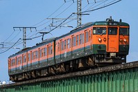 越後線白山～新潟間の信濃川橋梁を渡る、新潟車両センター所属の115系N38編成。この編成は、両先頭車が1000番台トップナンバーである。