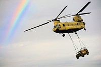 U.S. Army paratroopers assigned to Attack Company, 1st Battalion, 503rd Infantry Regiment, 173rd Airborne Brigade, conduct sling load operations with a CH-47 Chinook helicopter, from 6-101 GSAB, 101 CAB, Illesheim, Germany, during exercise Eagle Talon, Monte Romano, Italy, Jan 20, 2021. (U.S. Army photo by Elena Baladelli)