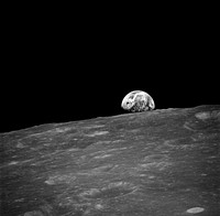 The first photograph taken by humans of Earthrise during Apollo 8.