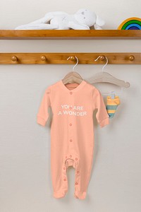 Baby pajamas mockup, kids apparel in peachy pink psd