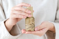 Cosmetic bottle mockup psd abstract earth tone pattern