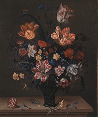 Tulips and other flowers in a room