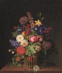 A light cane basket with flowers by C. D. Fritzsch