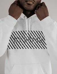 Men&#39;s white hoodie mockup on black model psd in studio