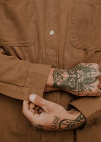 Jacket mockup psd on urban tattooed man model closeup