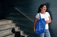 Accessory apparel mockup, tote bag psd, young woman on a staircase