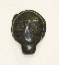 Face Amulet by Ancient Egyptian