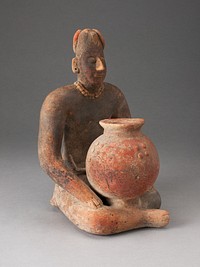 Seated Female Figure Holding a Vessel by Colima