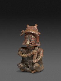 Seated Figure Playing a Rasp by Nayarit