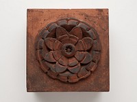 Raymond, E.G., Store and Flats: Rosette Fragment from Facade by Treat & Foltz (Architect)