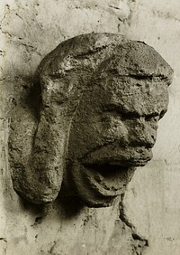 Ely Cathedral: Head in South Nave Triforium by Frederick H. Evans