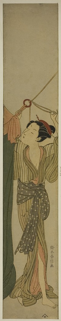 Hanging Up a Mosquito Net by Suzuki Harunobu