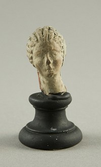 Head of a Woman with Melon Hairdo by Ancient Greek