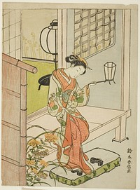 Woman Stepping Out with a Lantern by Suzuki Harunobu