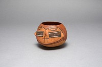 Bowl in the Form of a Trophy Head with Bound Lips and Shut Eyes by Nazca