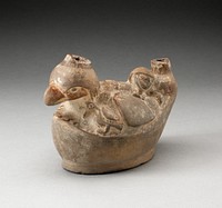 Stirrup Spout Vessel in Form of a Man Laying on a Bird by Moche