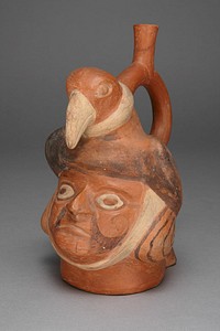 Vessel in Form of a Head Wearing a Bird Headdress by Moche