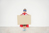 Super boy holding a mockup banner