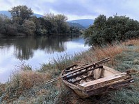 Wooden rowboat, nature lake.