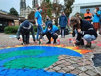 Action at Baden-Baden Reinsurance ConferenceOn October 17th, 2021, climate campaigners from a number of groups, including the Insure Our Future campaign, Greenpeace and Parents for Future, gathered to call on attendees of the Baden-Baden Reinsurance Conference to rule out coal from all reinsurance, including treaty reinsurance, to stop insuring all new oil and gas projects and to phase out existing oil and gas insurance in line with the 1.5C Paris Agreement goal.