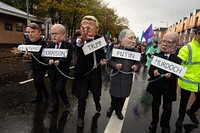 Climate March. Activists bring the message "Insure Our Future" to COP26 in Glasgow, Scotland, UK, on 6th Nov 2021.