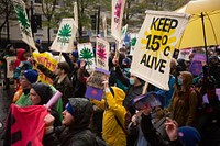 Climate activists bring the message "Insure Our Future" to COP26 in Glasgow, Scotland, UK, on 6th Nov 2021.