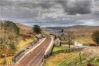 Dent StationIt might be called Dent Station, but it is over four miles from the actual village, being in Cowgill, in fact. It is also a long, long climb upwards from the valley bottom. Wouldn't fancy walking it with my holiday luggage, that is for sure. This is a section of the Settle to Carlisle railway line.