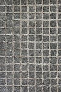Square Stone Grid PaversA unique texture photographed in central Tokyo, Japan.