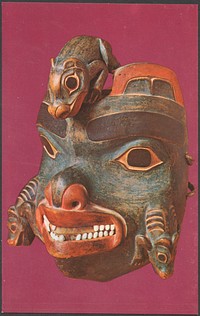             Carved wooden mask with animals          