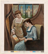             Two women looking at fringed card          