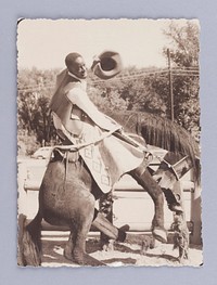 Untitled (Man Dressed as a Cowboy on a Fake Horse)