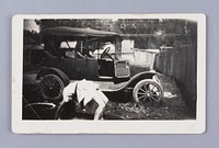 Untitled (Woman Doing a Back Bend by an Automobile)