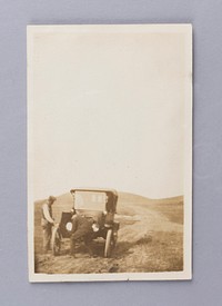 Untitled (Two Men Cranking an Automobile)