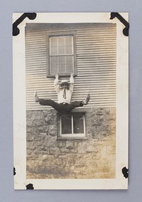 Untitled (Man Hanging Off Window Ledge)