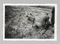 Untitled (men wrestling on ground)