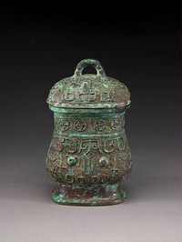 Covered Wine Vessel (zhi) with Design of Zoomorphic Masks and Spiral Patterns